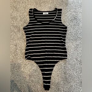 Black and tan stripe body suit